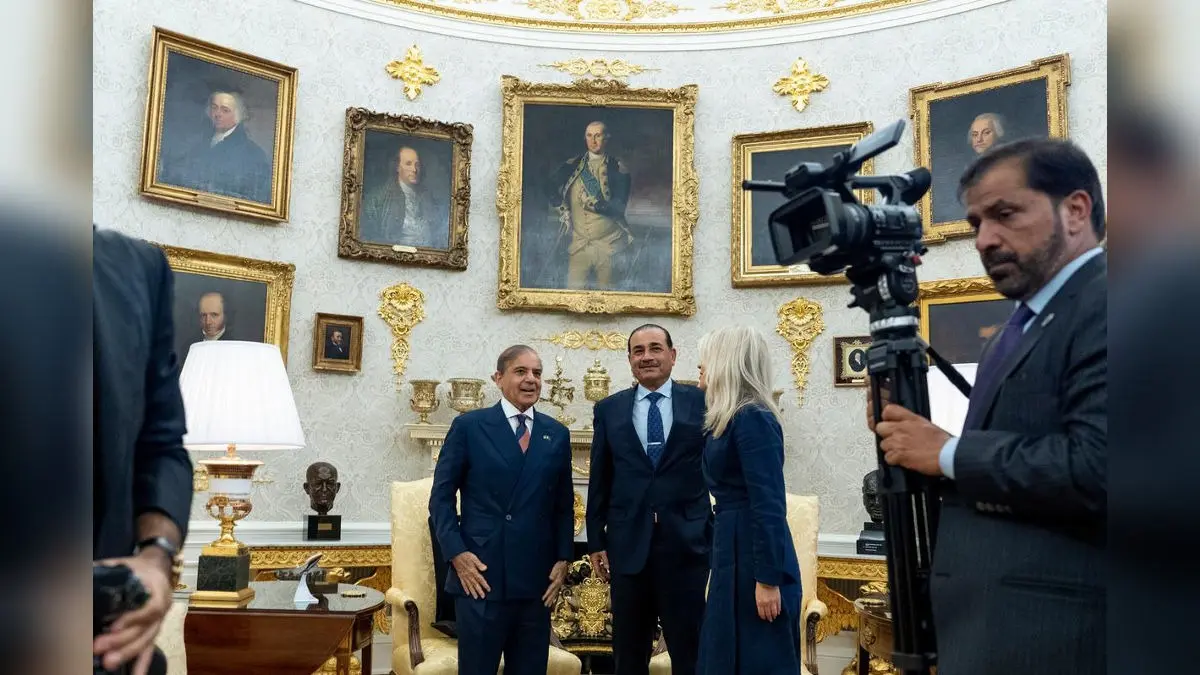 Major Embarrassment For Pak: PM, Field Marshal Forced To Wait As Trump Acknowledges 'We're Late' Pakistan Prime Minister Muhammad Shehbaz Sharif, left, and Gen. Syed Asim Munir wait for their meeting with President Donald Trump, in the Oval Office at the White House in Washington.