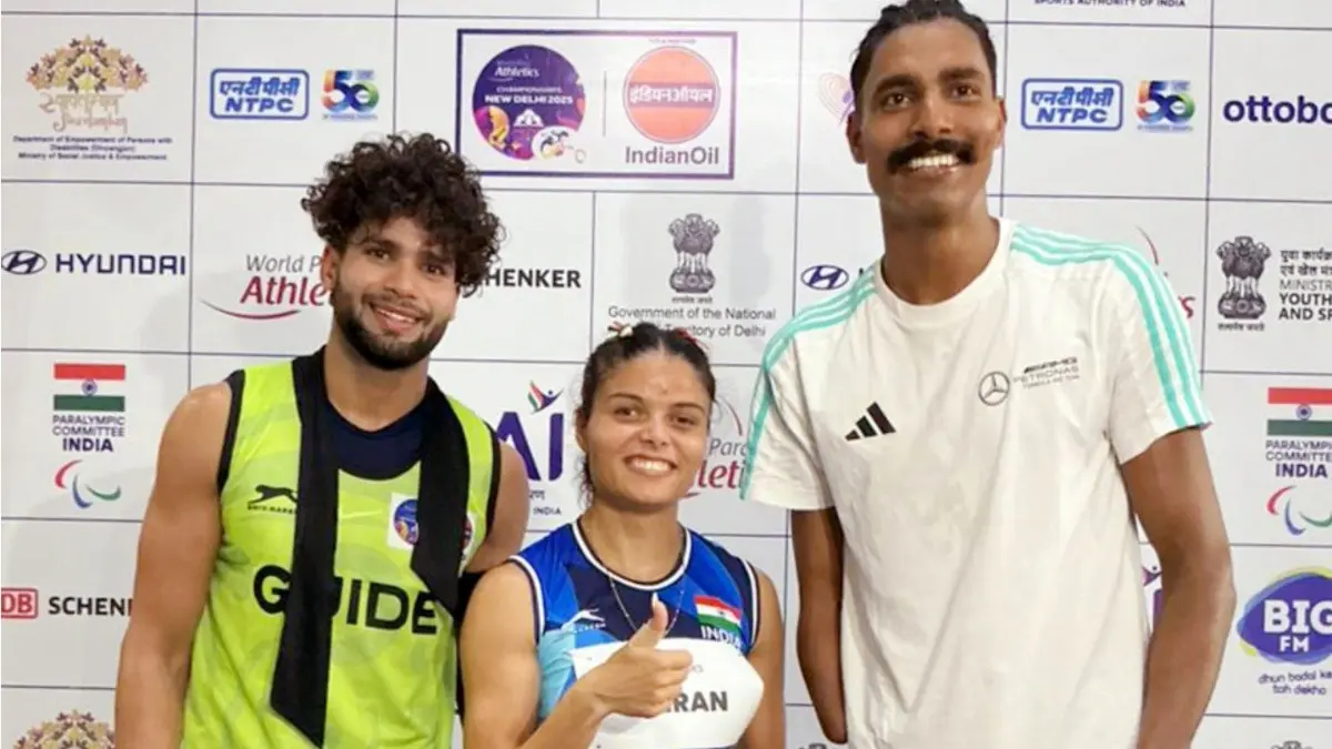 Para Athletes Simran Sharma and Nishad Kumar pose for a photo, after winning gold medals at the World Para Athletics Championships 2025
