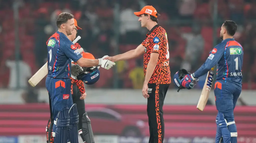 Pat Cummins greets David Miller