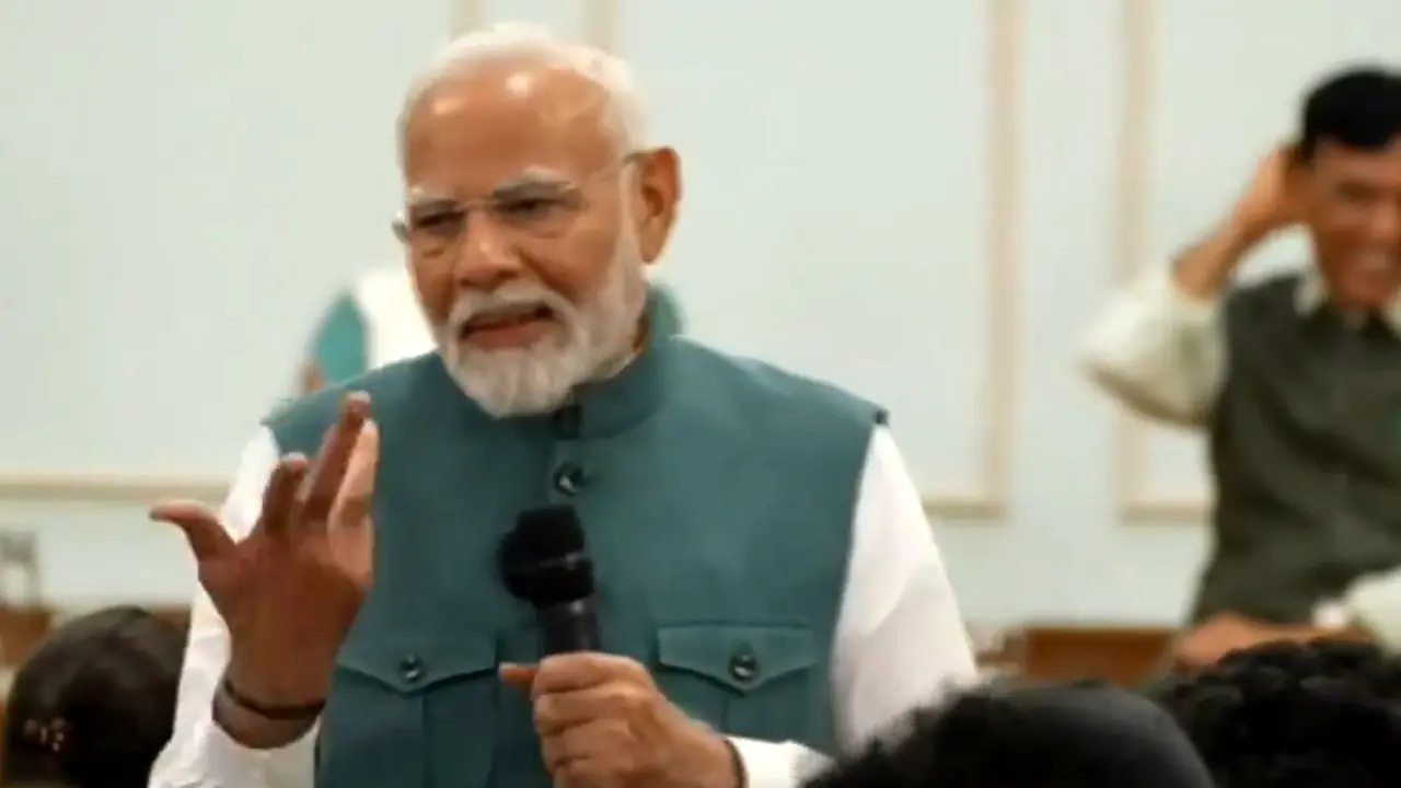 PM Modi during interaction with India's Paris Olympic contingent