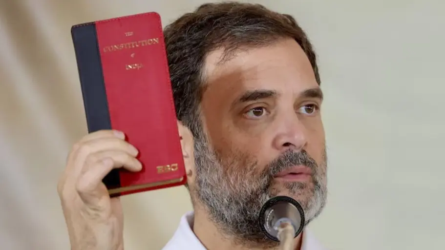 What's Inside The Red Constitution Handbook That Rahul Gandhi Holds? Popularised by Rahul Gandhi, pocket version of Constitution drawing fancy