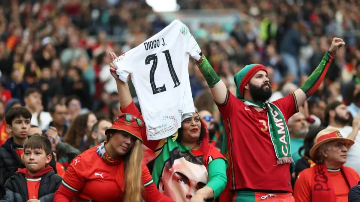 Real Madrid Apologizes For Showing Wrong Player In Tribute To Diogo Jota and André Silva Portugal supporters hold a shirt with the number of late Portuguese player Diogo Jota