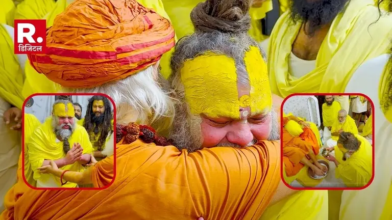 प्रेमानंद महाराज ने पहली पर अपनी गद्दी पर किसी संत को बैठाया, साष्टांग प्रणाम कर गले मिले और धोए पांव premanand maharaj met karshni guru swami sharnanand