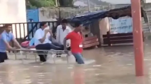 Video Of Shahjahanpur Medical College Staffers Carrying Principal Avoiding Flooded Roads Goes Viral