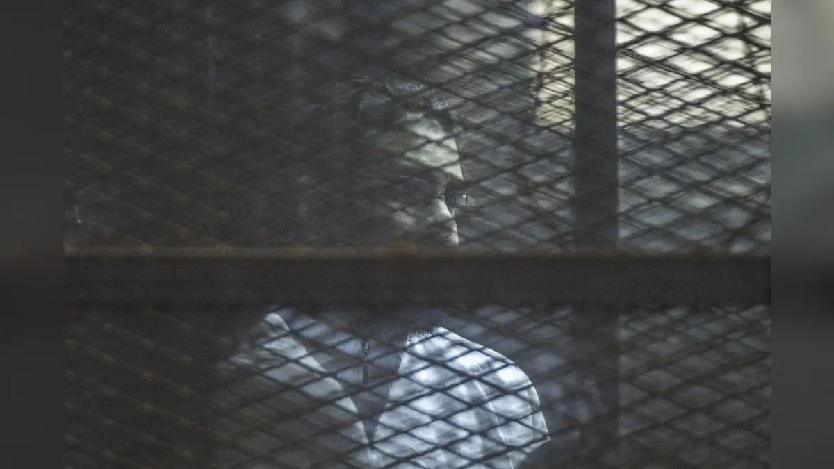 Egypt Announces Pardon For Top Activist Who's Spent 6 Years Behind Bars Prominent Egyptian activist Alaa Abd el-Fattah during a verdict hearing for 21 people over an unauthorised street protest in 2013, in a courtroom in Cairo, Egypt.