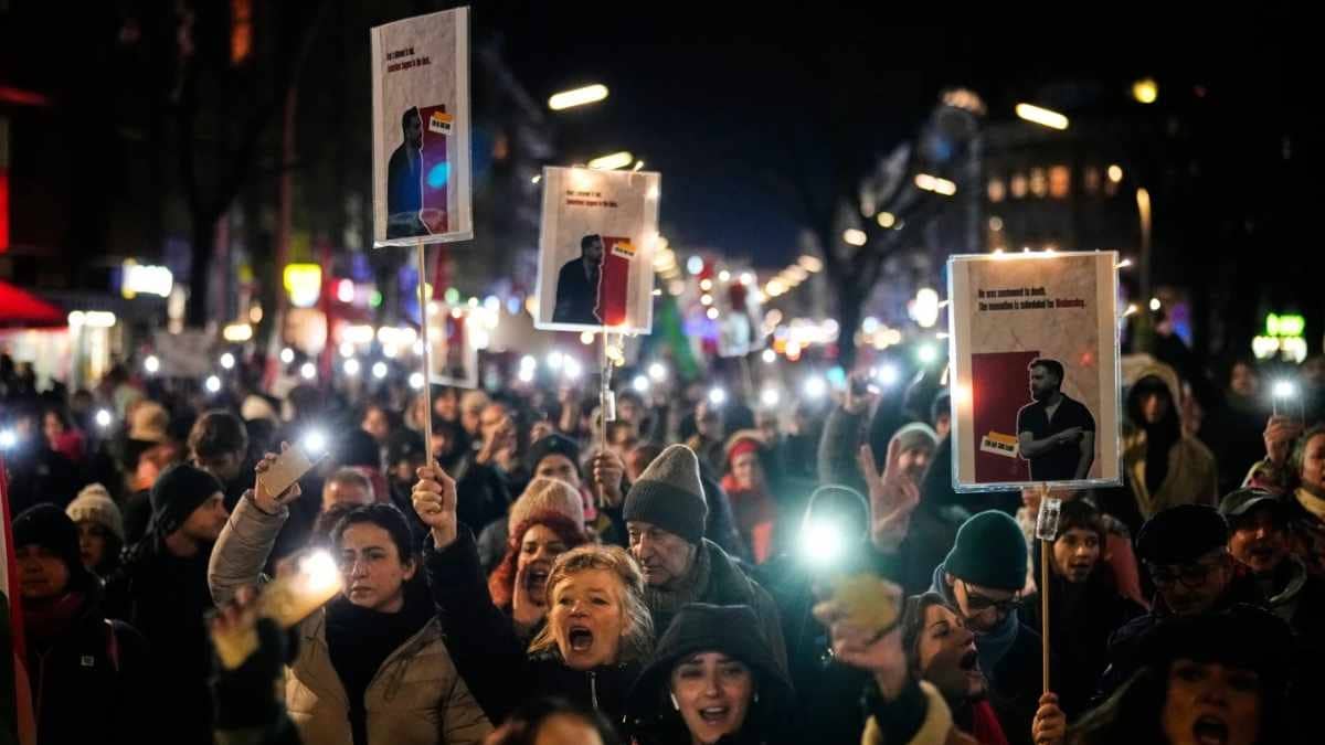 'Can’t Really Stop Reading News': Exiled Iranians In Europe Protest Against Govt Crackdown