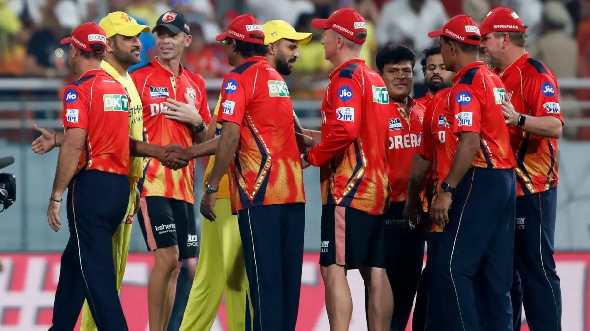 Punjab Kings players shake hands with Chennai Super Kings cricketers