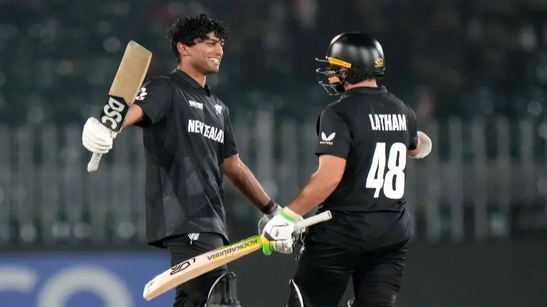 Rachin Ravindra celebrates his century against Bangladesh