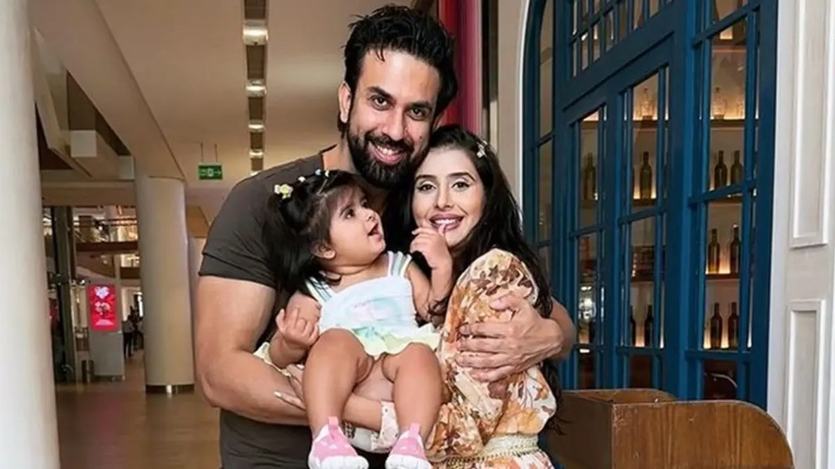 Rajeev Sen and Charu Asopa with their daughter