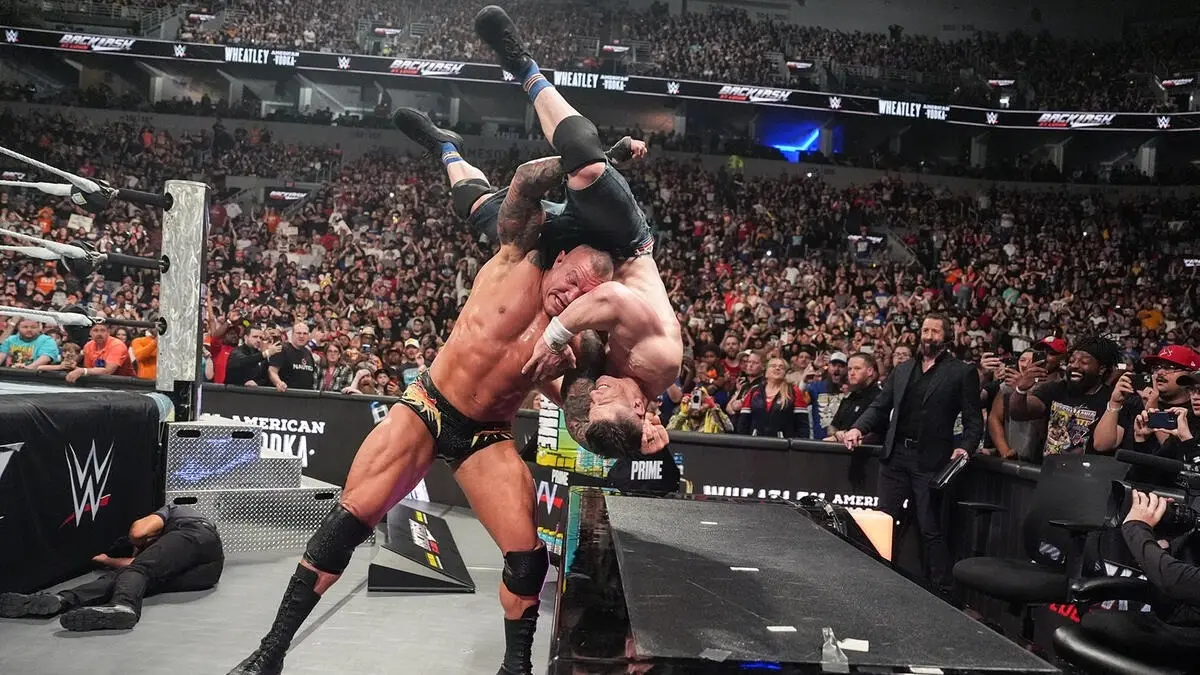 Randy Orton hits John Cena with an Attitude Adjustment