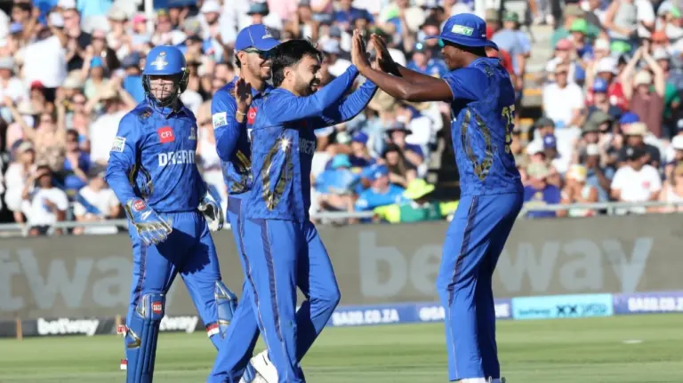 Rashid Khan celebrates a fall of wicket