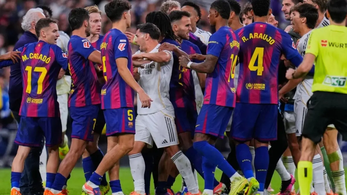 Real Madrid and FC Barcelona players scuffle during the last El Clasico in La Liga