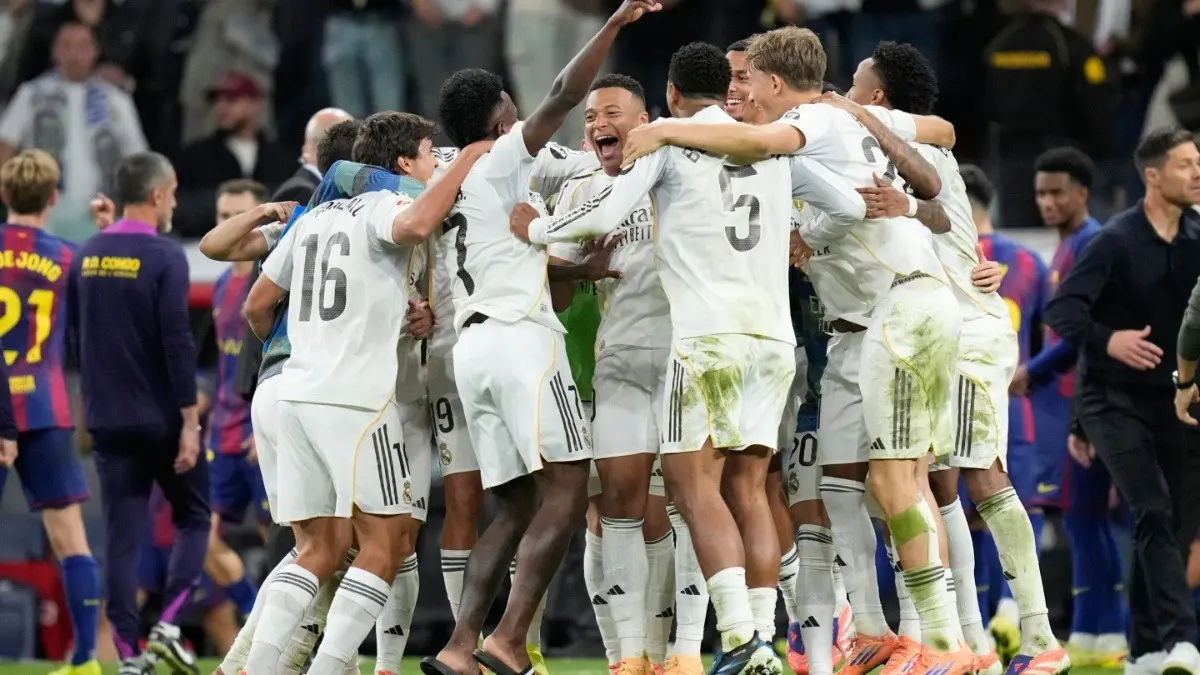 Real Madrid players celebrating after win over FC Barcelona