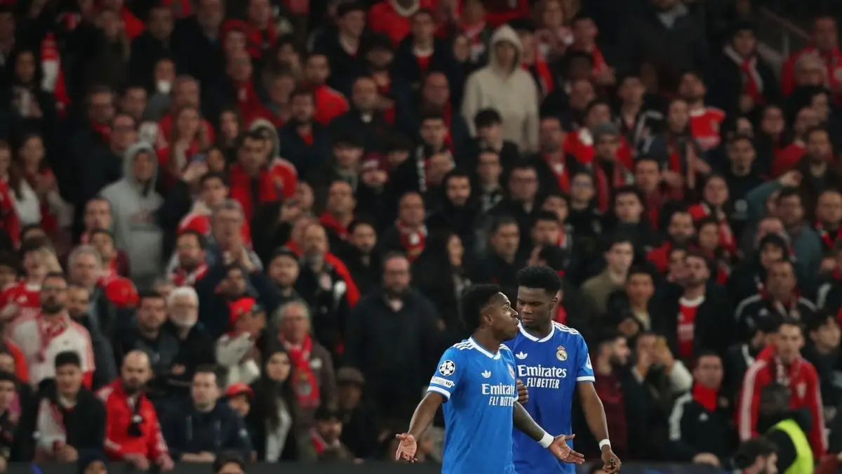 Benfica Suspend Five Supporters Following Alleged Racial Abuse Incident In Champions League Playoff Clash Against Real Madrid Real Madrid's Vinicius Junior argues with Benfica players