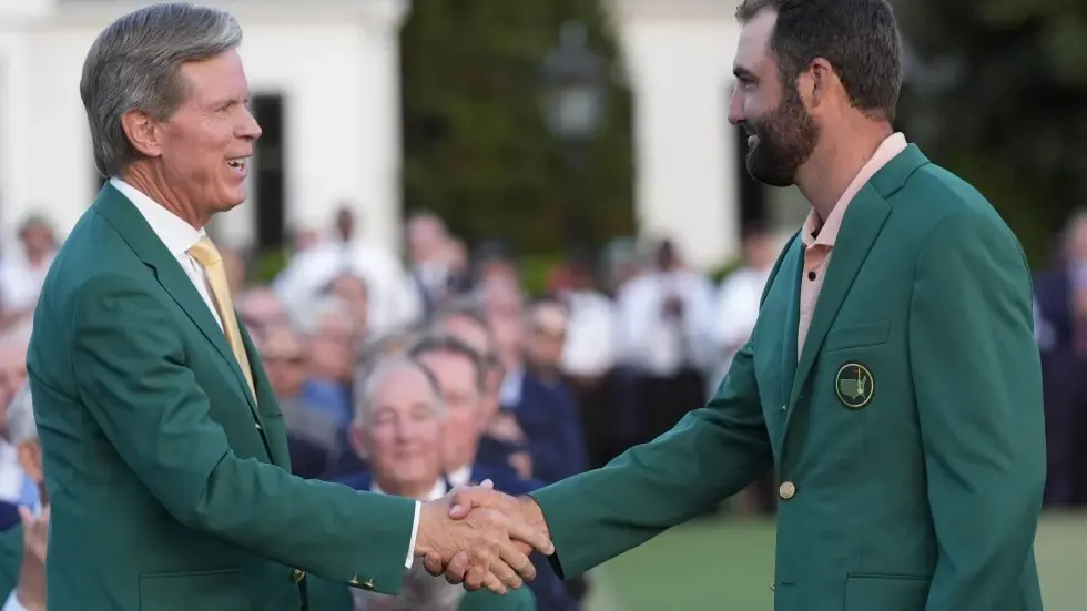 The Masters Adds Two Hours Of Weekend Coverage On Paramount red Ridley, chairman of Augusta National Golf Club, shakes hands with Winner Scottie Scheffler
