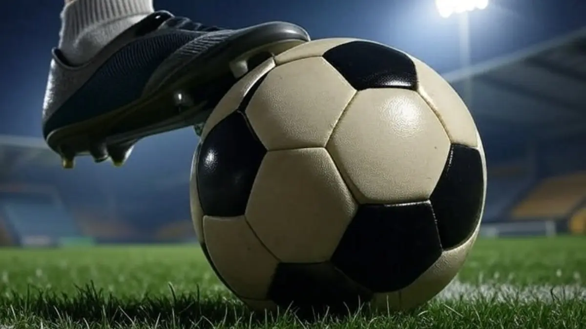 Representative image of a player's boot on a football