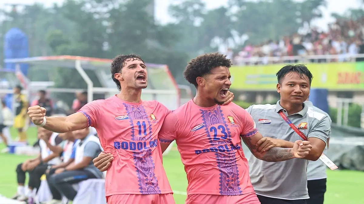 Robinson celebrates his goal for Bodoland FC