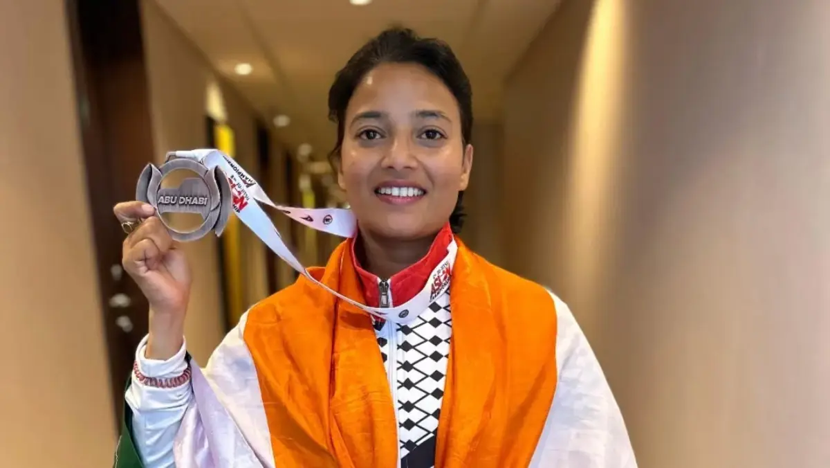 Rohini Kalam with the bronze medal in the 8th Asian Championship