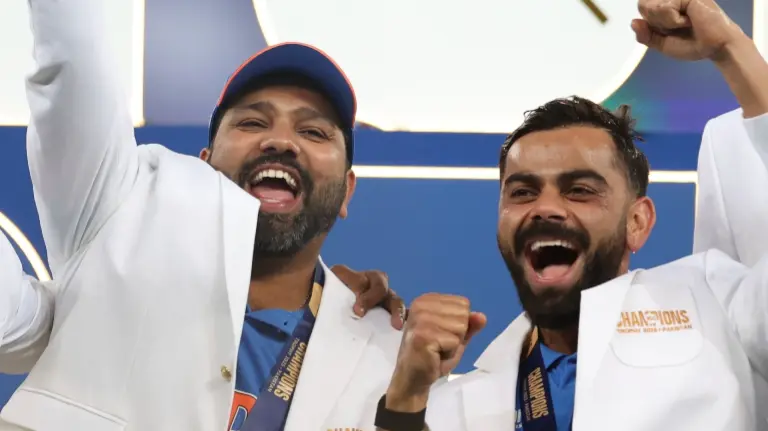 Rohit Sharma and Virat Kohli celebrate India's Champions Trophy win
