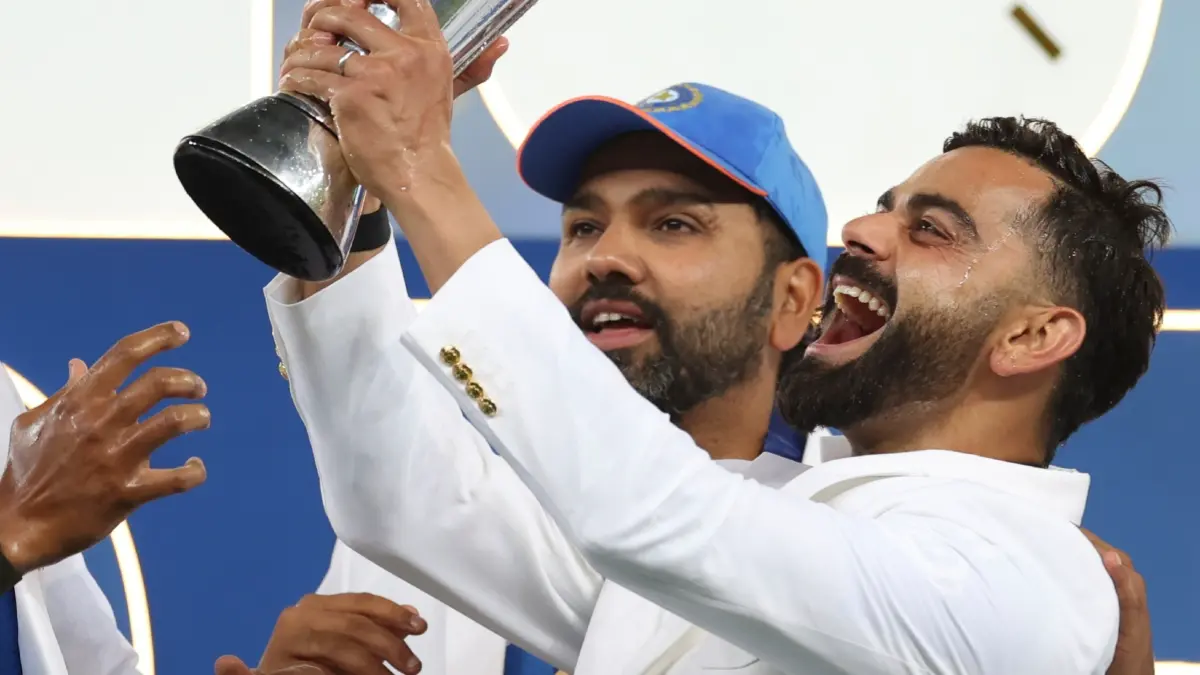 Rohit Sharma and Virat Kohli celebrate India's Champions Trophy win