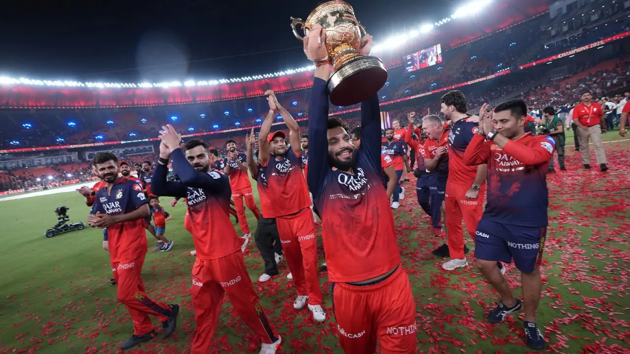 RCB to Hold Victory Parade After Clinching IPL 2025 Title on June 4 - From 4 PM Start Time to Live Streaming, Here's All You Need to Know Royal Challengers Bengaluru's captain Rajat Patidar celebrates with the winners trophy after their win in the Indian Premier League final.