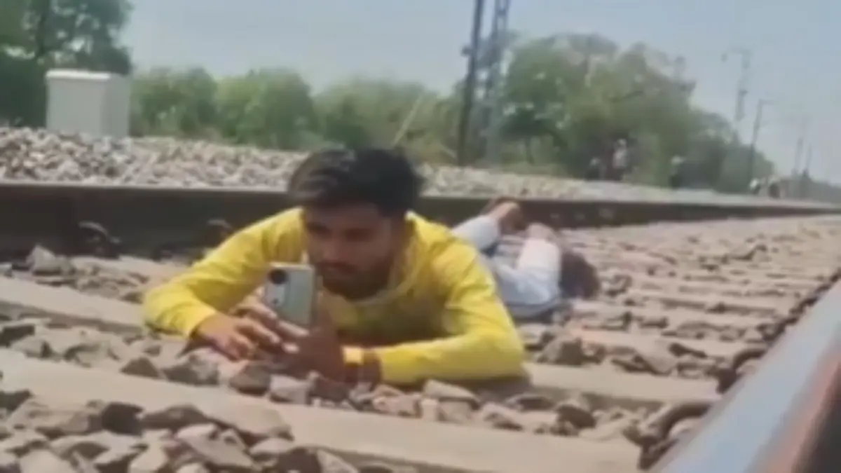 Youth Risks Life for Reel: Lies on Railway Track to Shoot Video, Arrested After Clip Goes Viral Youth Risks Life for Reel: Lies on Railway Track to Shoot Video, Arrested After Clip Goes Viral