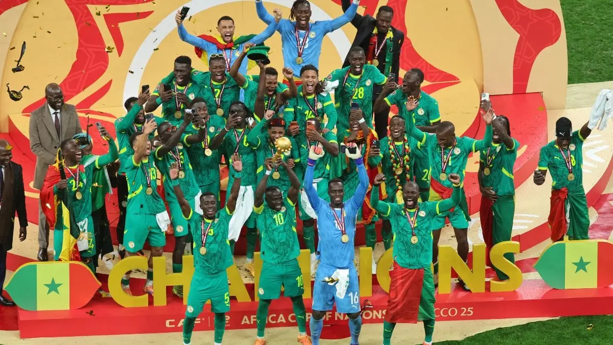 Organizers Say 2027 Africa Cup Will Take Place As Planned In Tanzania, Uganda And Kenya Senegal team celebrates winning AFCON
