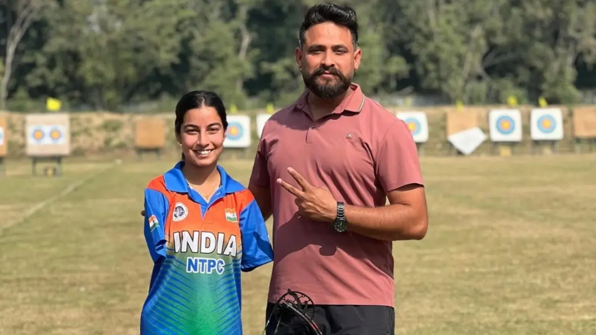 Sheetal Devi with her coach, Gaurav Sharma