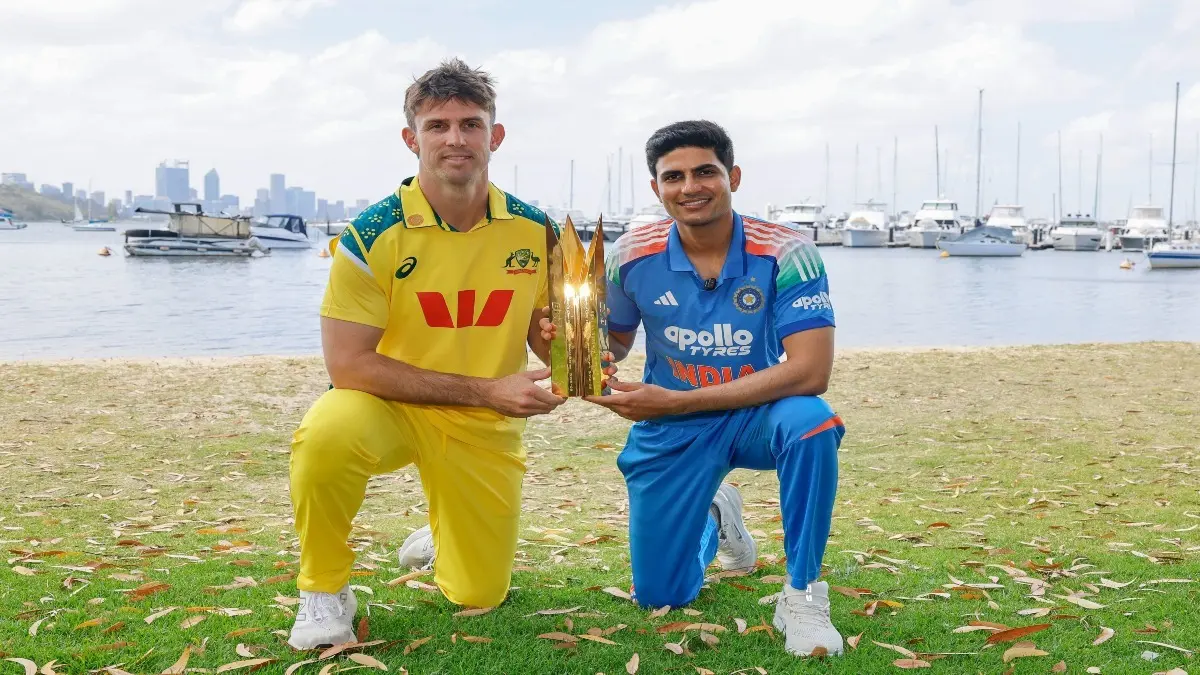 Shubman Gill and Mitchell Marsh with the ODI series trophy