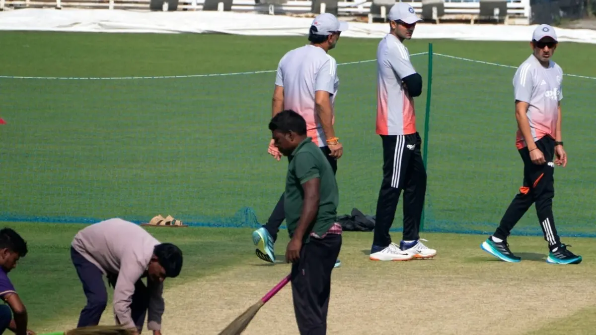 Sitanshu Kotak, Shubman Gill and Gautam Gambhir inspecting the Eden Gardens pitch