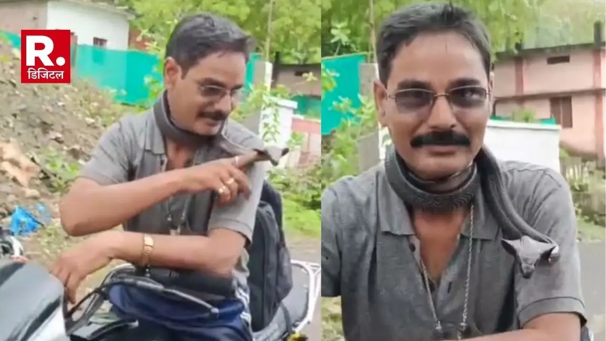 Snake catcher riding bike with cobra around his neck died due to a cobra bite