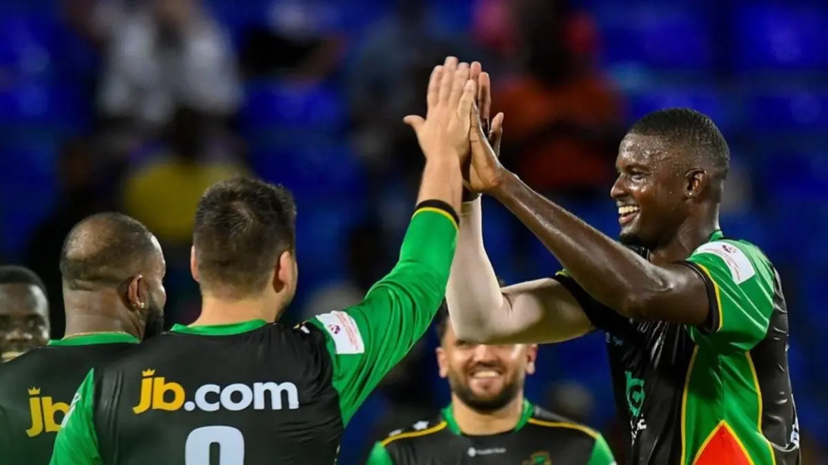 St Kitts and Nevis Patriots players celebrating after taking a wicket