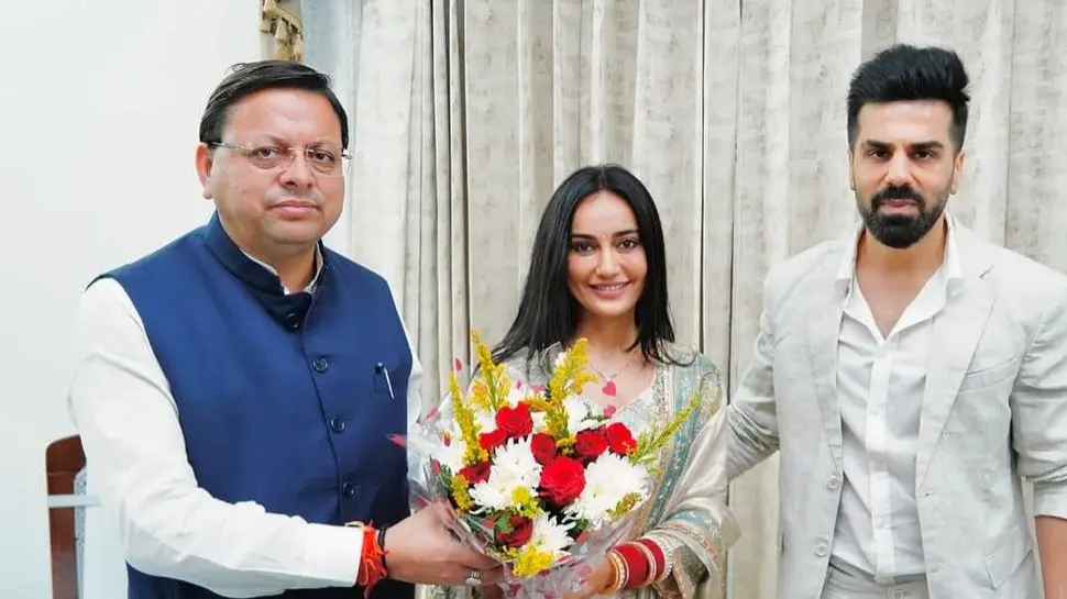Newlyweds Surbhi Jyoti-Sumit Suri Meet Uttarakhand CM Pushkar Singh Dhami | PHOTO Surbhi Jyoti, Sumit meet Uttarakhand CM Pushkar Singh Dhami post wedding