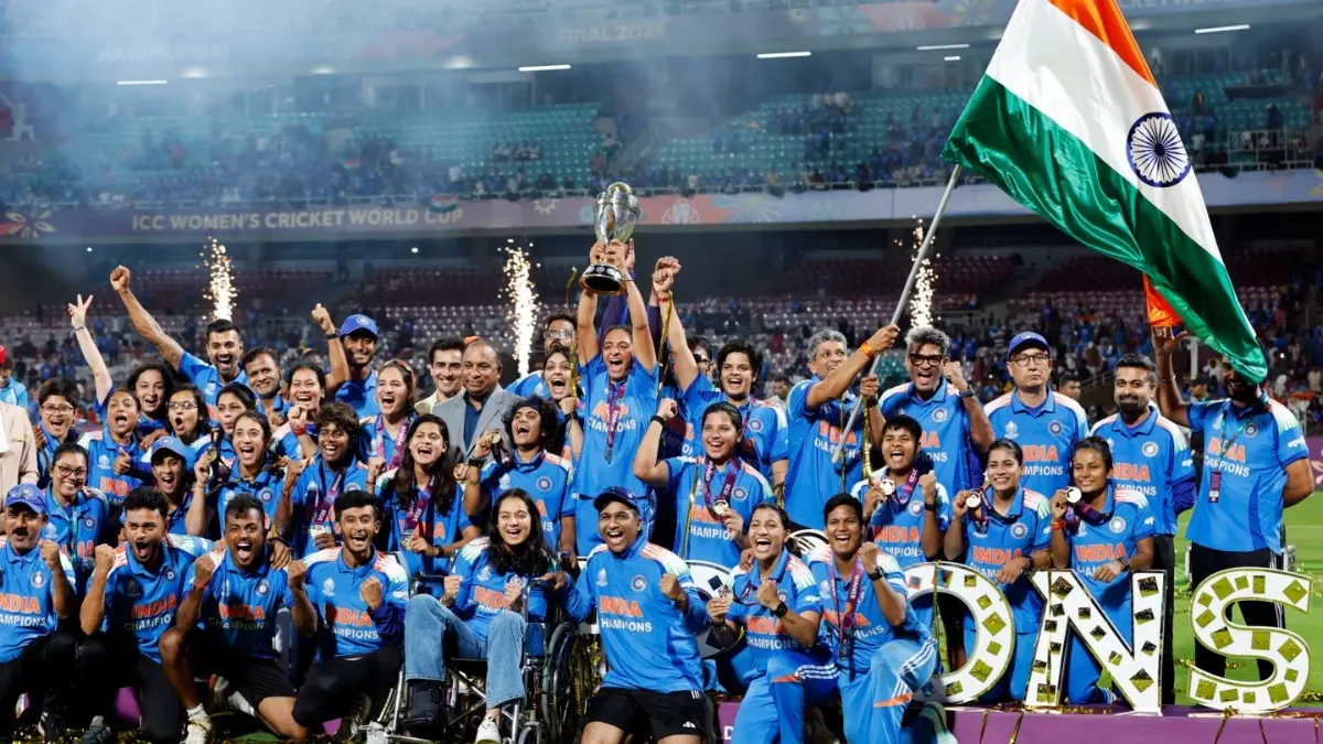 Days After Women's World Cup Triumph, Harmanpreet Kaur-led Team India Likely To Appoint Foreign Strength & Conditioning Coach: Report Team India players celebrate with the trophy after winning the ICC Women's World Cup 2025