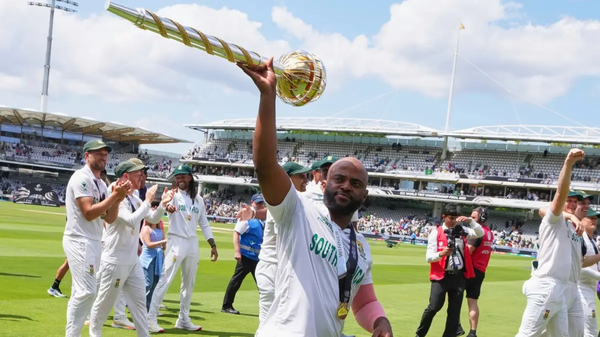 South Africa captain Temba Bavuma celebrates with the WTC trophy