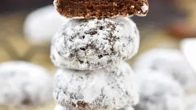National Espresso Day 2024: Break The Routine With Irresistible Espresso Snowball Cookies These delightful treats combine the bold flavour of espresso with the richness of chocolate, creating a festive and indulgent dessert perfect for the season.
