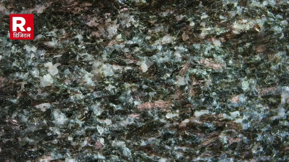 This photo provided by researcher Jonathan O’Neil shows a closeup of a rock from Canada’s Nuvvuagittuq Greenstone Belt dated to about 4.16 billion years old