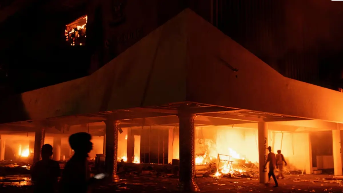 Three dead as Indonesian protesters set fire to regional parliament building