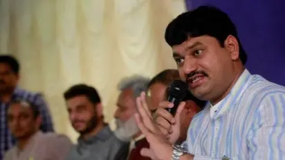 Under-fire Munde Says Ready to Resign if Asked by Fadnavis or Deputy CM Ajit Pawar Under-fire Munde Says Ready to Resign if Asked by Fadnavis or Deputy CM Ajit Pawar