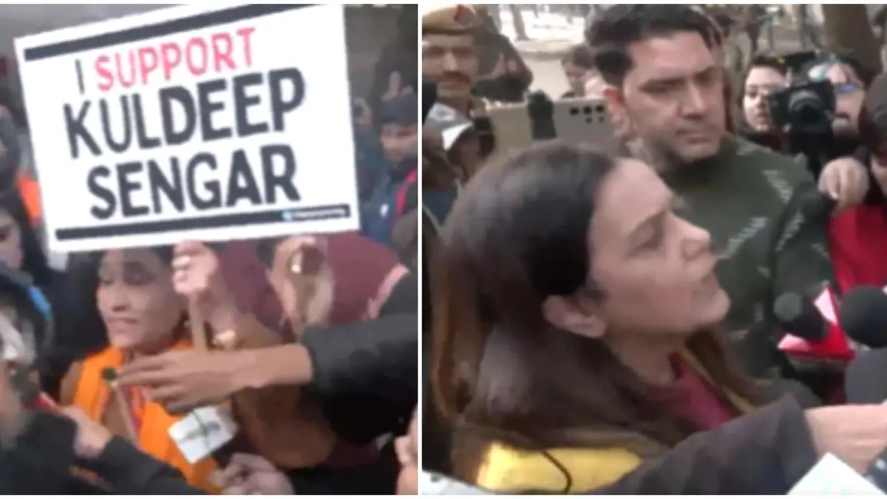 Unnao Rape Survivor's Supporters Chant 'Shame On You' During Clash With Group Holding 'I Support Sengar' Poster Unnao Rape Survivor's Supporters Chant 'Shame On You' During Clash With Group Holding 'I Support Sengar' Poster