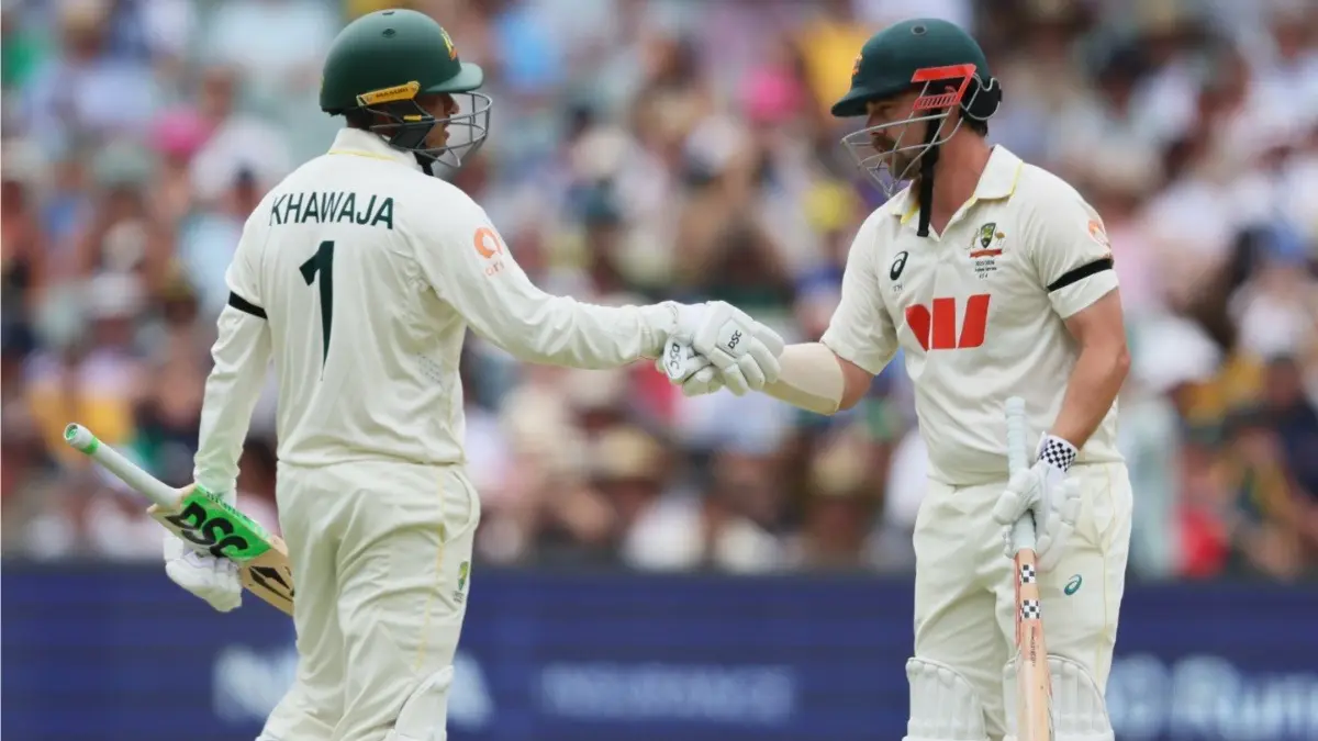 Usman Khawaja and Travis Head