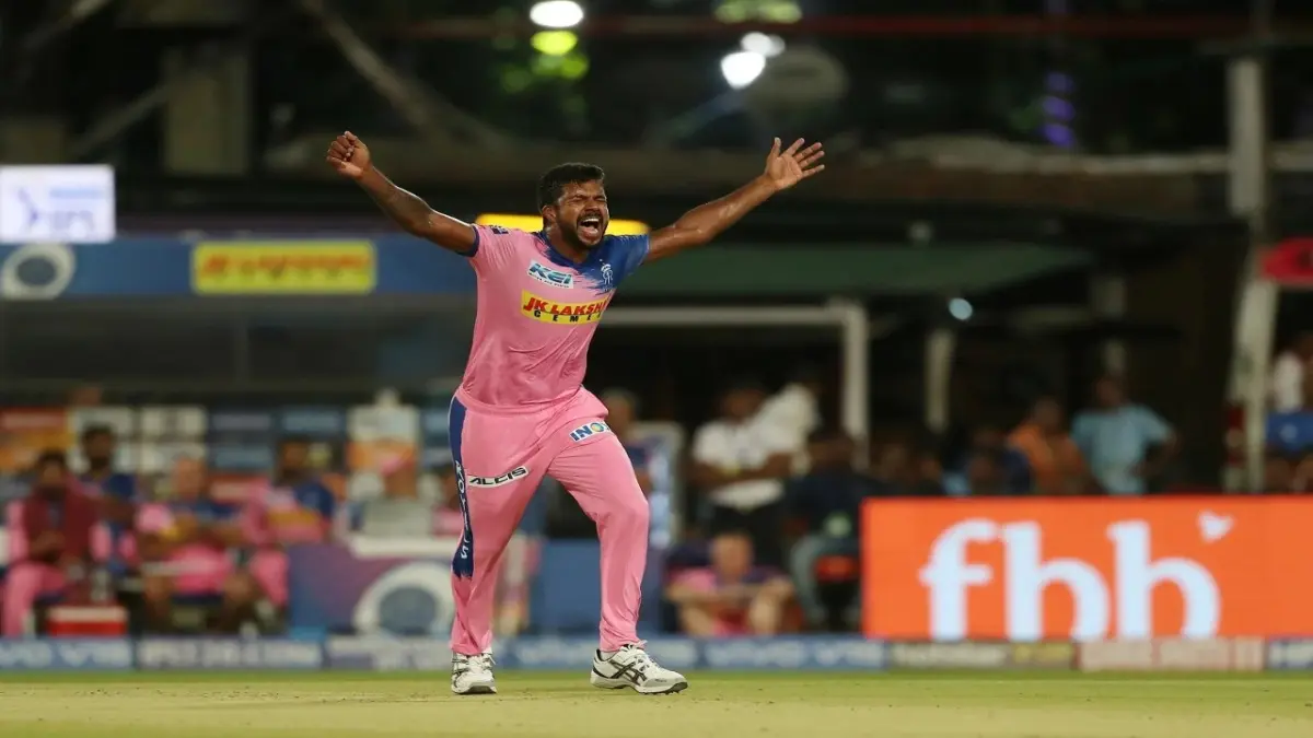 Varun Aaron celebrates his wicket