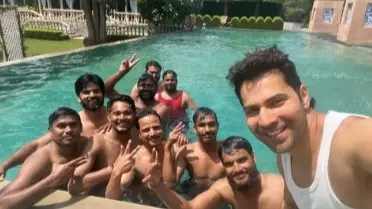 Sunny Sanskari Ki Tulsi Kumari: Varun Dhawan Takes A Refreshing Break With The Art Team Varun Dhawan Enjoys Pool Time With The Art Team Of 'Sunny Sanskari Ki Tulsi Kumari'