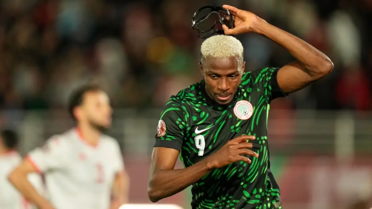 Victor Osimhen reacts after scoring