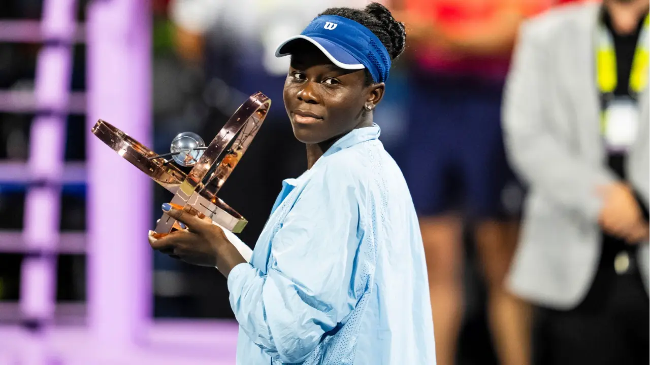 Serena Williams' 26-Year Old Record Matched by Victoria Mboko After She Wins Toronto Masters Final vs Naomi Osaka Victoria Mboko holds the trophy after her win over Naomi Osaka.