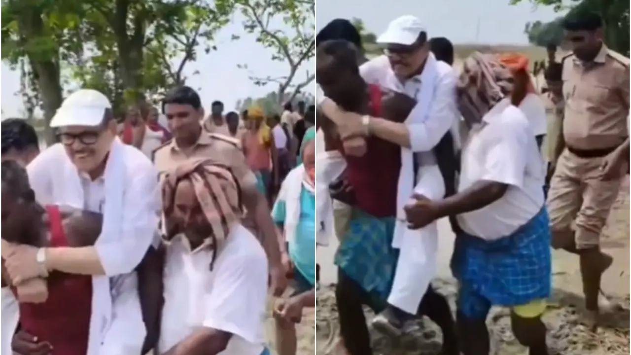 Rahul Gandhi on Malaysia Trip, his MP Piggybacks on Local During Flood Survey in Bihar | Viral Video Sparks Outrage Video shows Congress MP Tariq Anwar piggybacks on locals during a flood survey in Bihar.