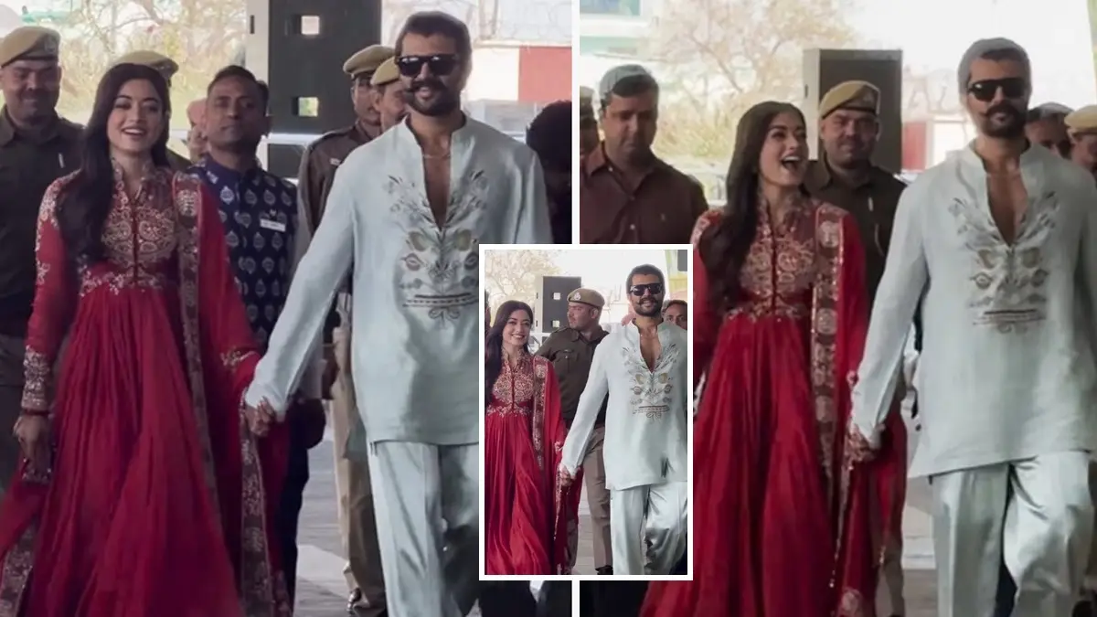 Vijay-Rashmika Post Wedding Look: हाथों में हाथ, चेहरे पर खुशी और फ्लाइंग KISS...शादी के बाद कपल की पहली झलक, एयरपोर्ट पर आए नजर- VIDEO Vijay deverakonda and rashmika mandanna post wedding Udaipur airport look hand in hand video viral