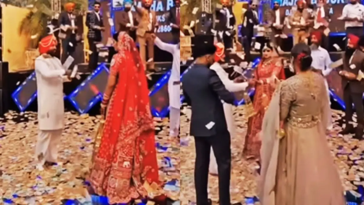 पंजाबी शादी में दूल्हा-दुल्हन पर जमकर हुई नोटों की बारिश, क्या लुटाए गए 8 करोड़ रुपये? जानें वायरल VIDEO में दावे की सच्चाई Viral Video