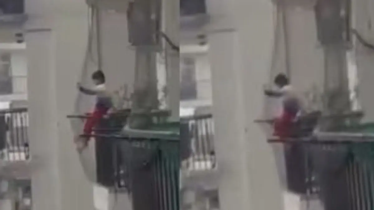4-Year-Old Sits On High-Rise Balcony Grill In Ghaziabad, Chilling Video Leaves Onlookers Stunned | WATCH