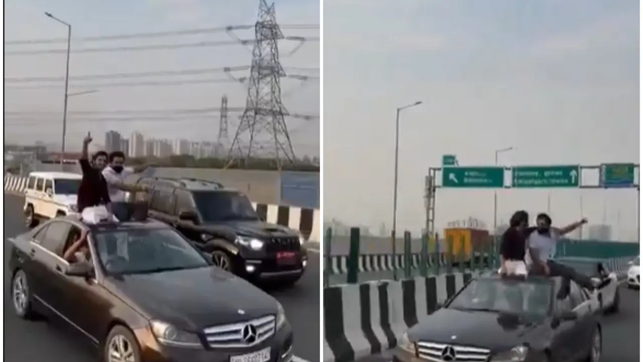 Viral video shows men performing risky stunts and dancing on a moving Mercedes.
